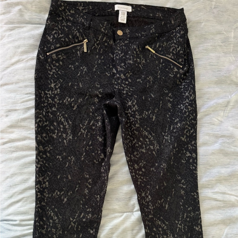 Cache Size 10 black and gold pants.